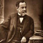 Photograph of Louis Pasteur sitting at his desk