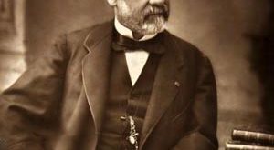 Photograph of Louis Pasteur sitting at his desk